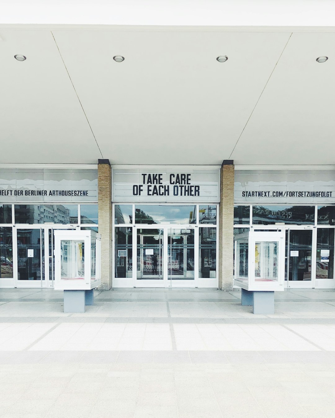 Services-01 white-and-brown-concrete-building-iay9obr5eo4